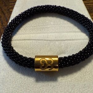 Sophisticated Black and Gold Bracelet
